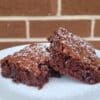 Squares of Buttermilk Brownies dusted with confectioners sugar