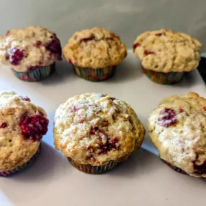 six raspberry muffins