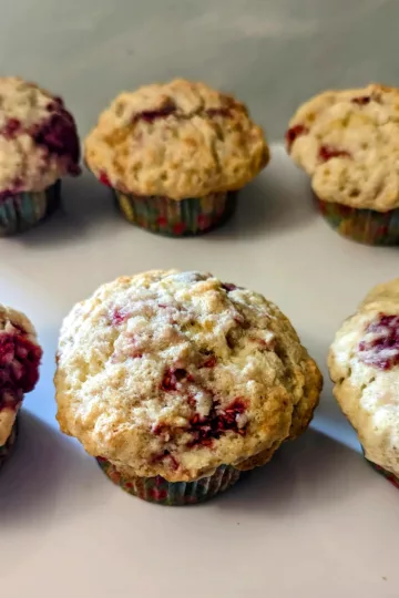 six raspberry muffins
