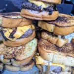 A stack of five patty melts