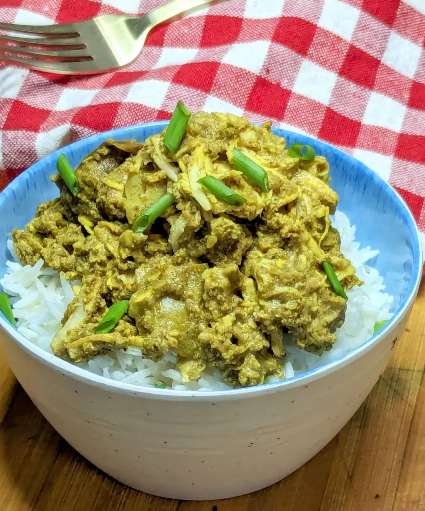Bowl of Jamaican style chicken curry with rice